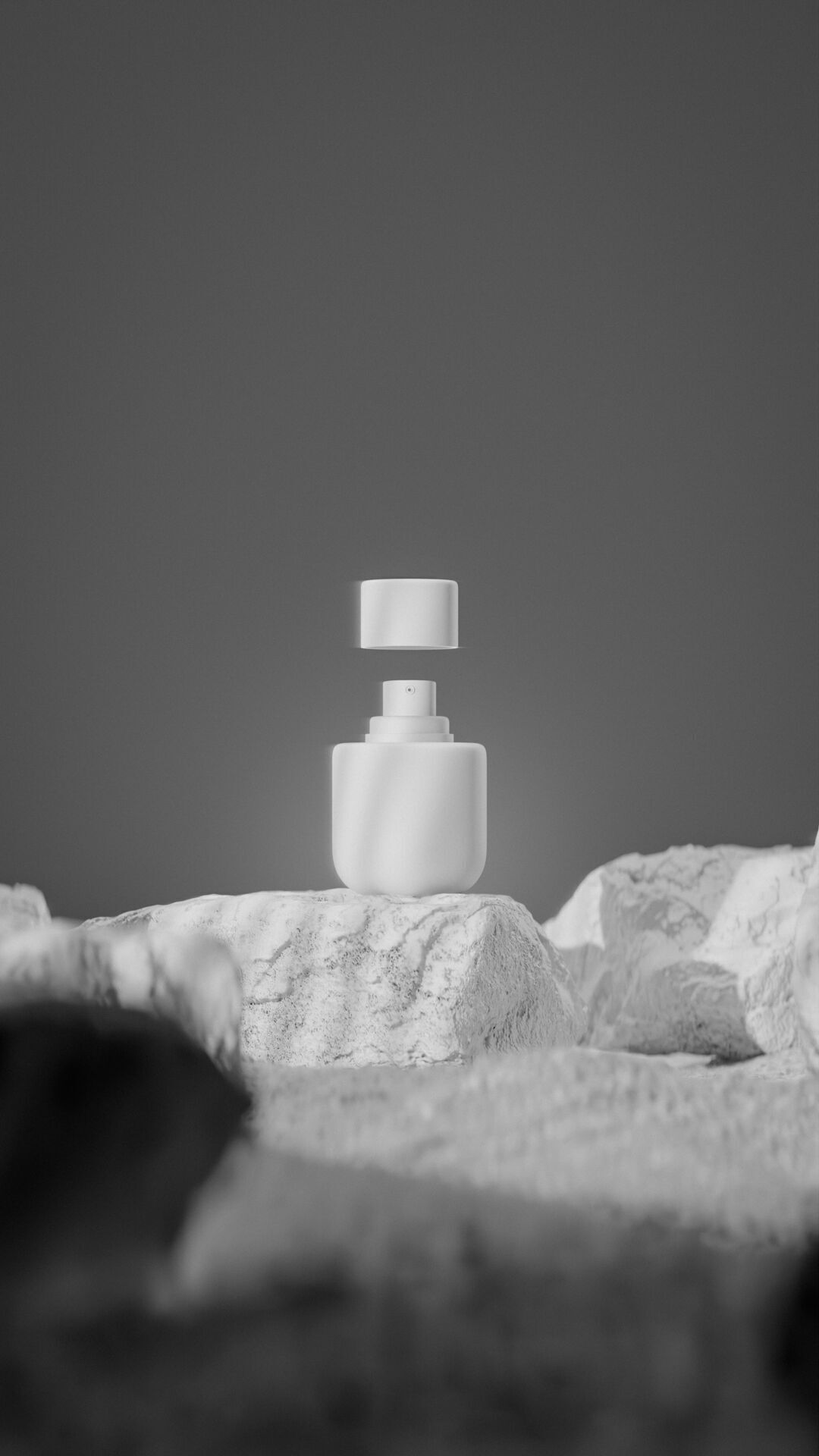 Bottle perfume on rocky surface Low-poly 3D model_36