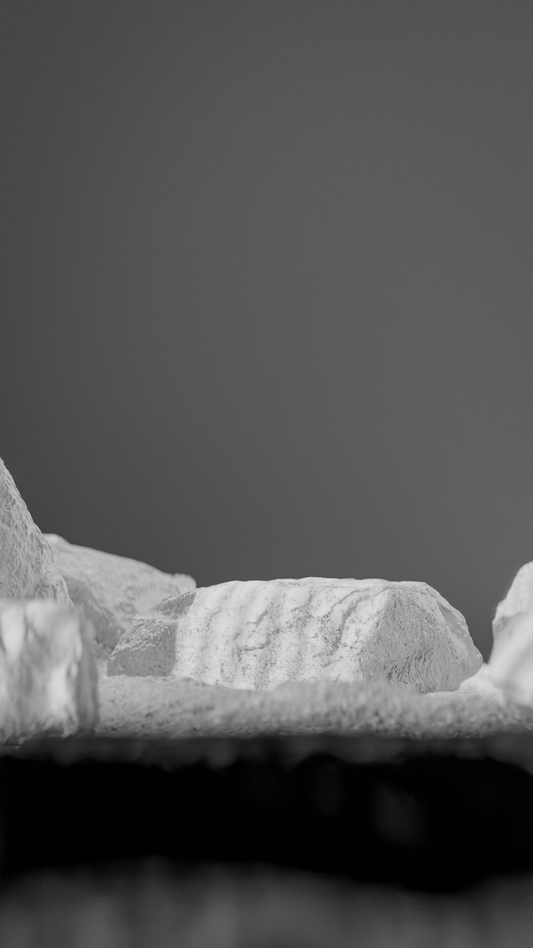 Bottle perfume on rocky surface Low-poly 3D model_58