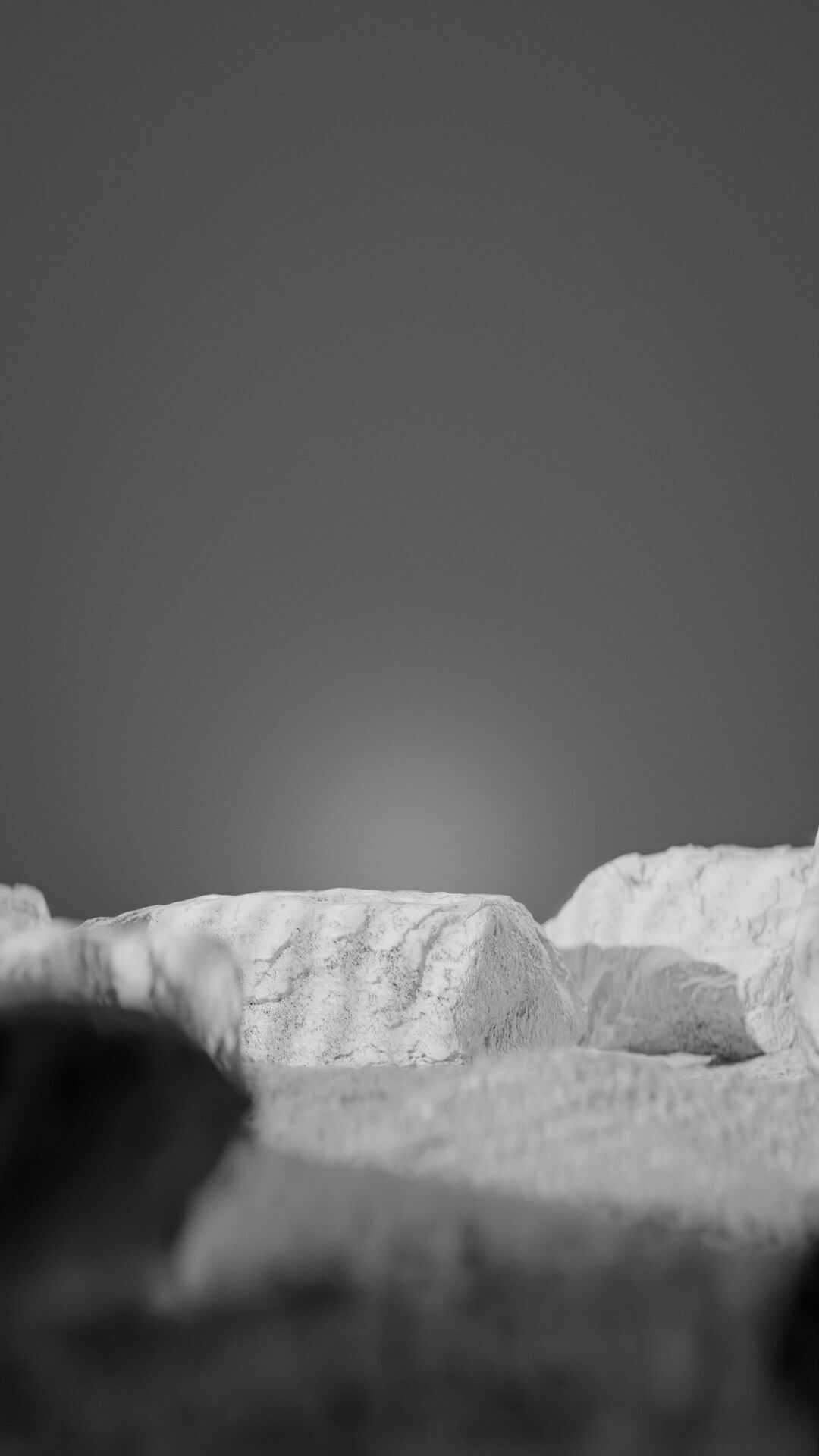 Bottle perfume on rocky surface Low-poly 3D model_56