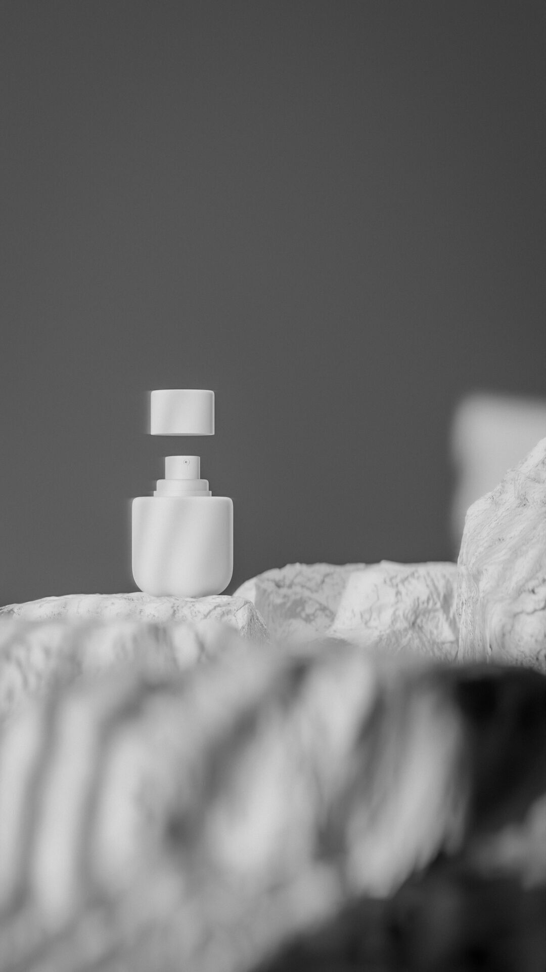 Bottle perfume on rocky surface Low-poly 3D model_37