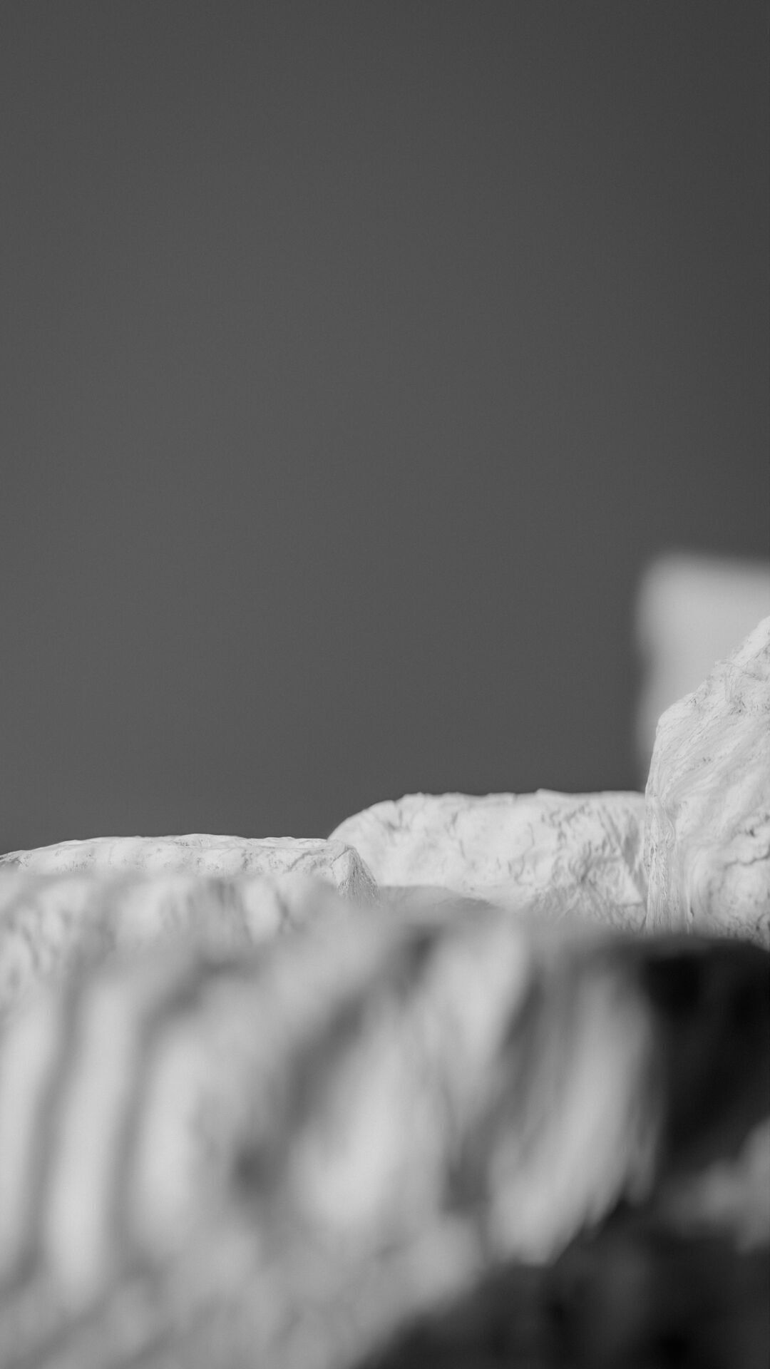 Bottle perfume on rocky surface Low-poly 3D model_57