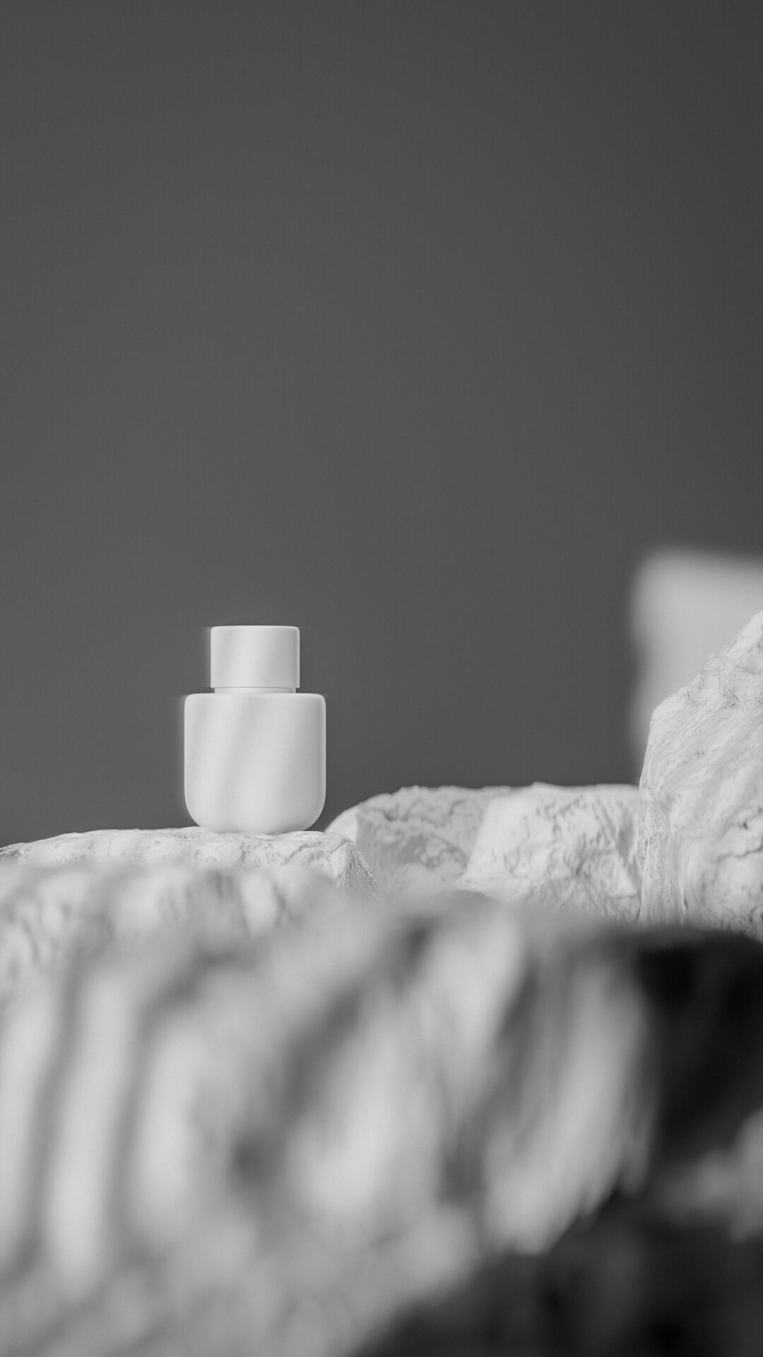 Bottle perfume on rocky surface Low-poly 3D model_17