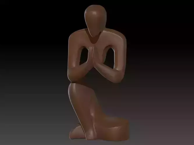 sculpture of a man praying