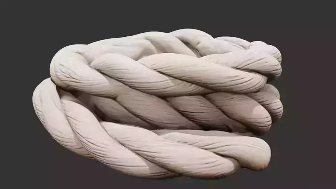 Coiled Rope Bundle on Wooden Floor