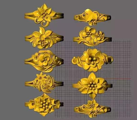 Collection of 10 24k  gold flower rings