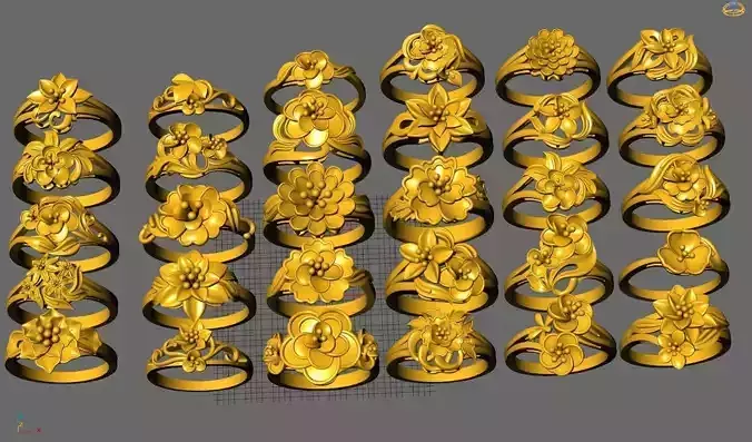 Collection of 30 24k gold flower rings