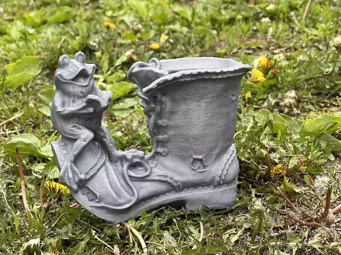 Garden sculpture Frog on a boot