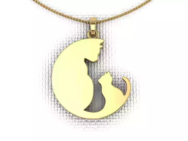 A pendant made in the shape of a cats