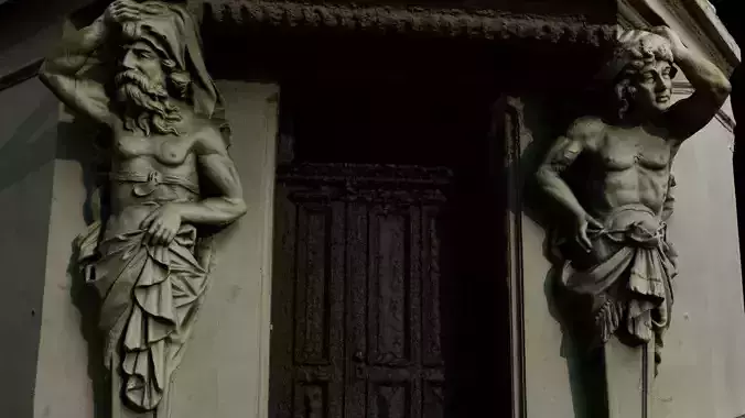 statues in house front