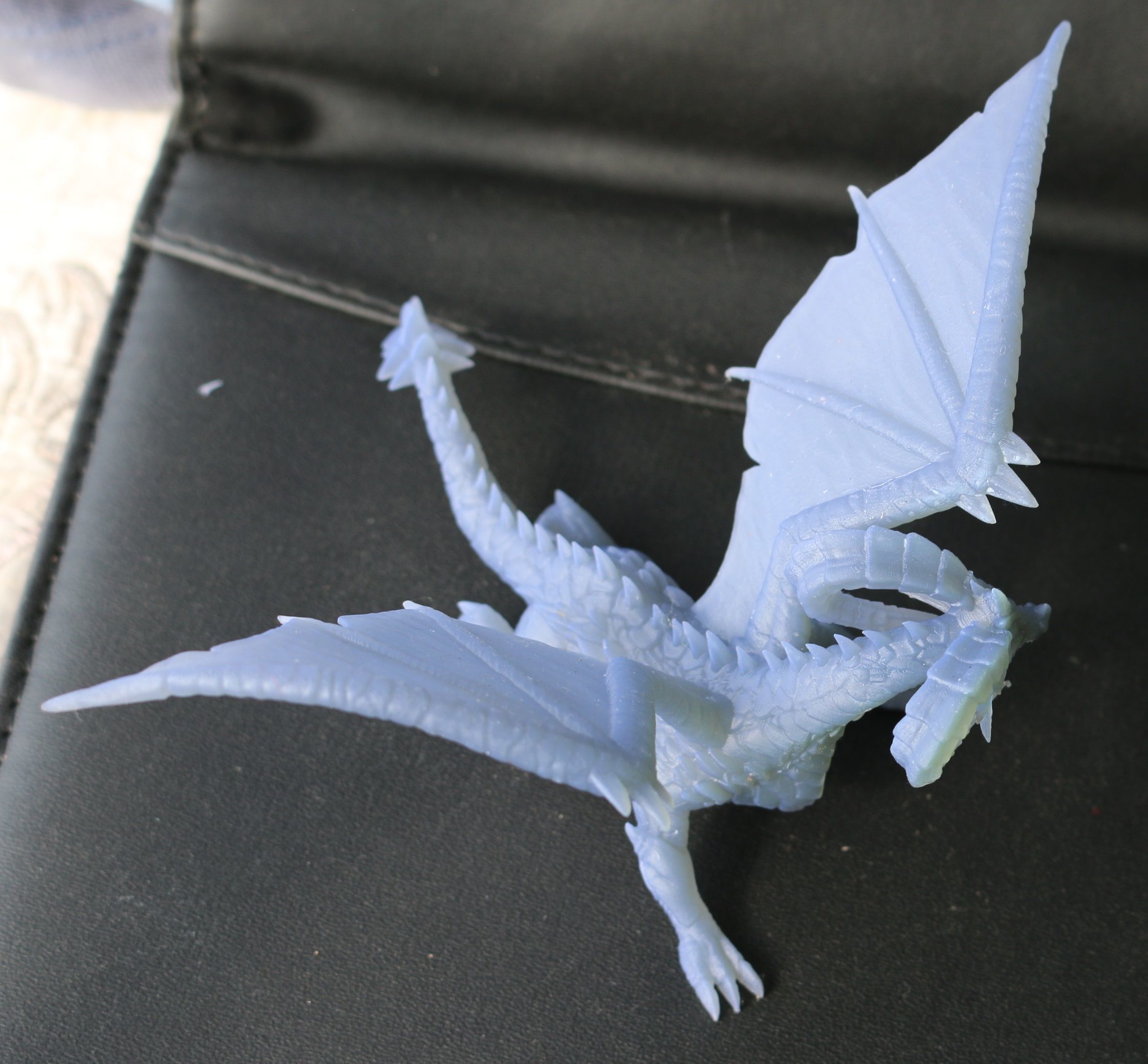 Dragon gold toy on dashboard of car 3D print model_2