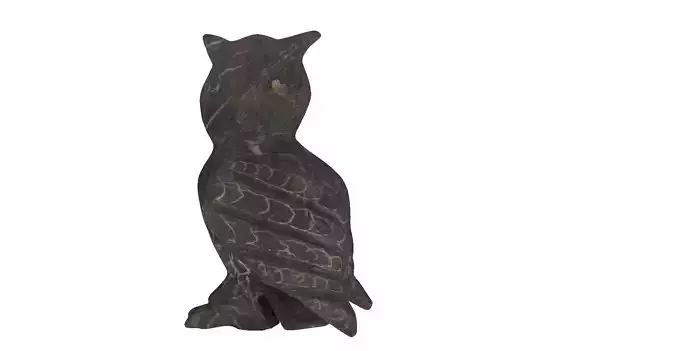 Dark marble statue of a owl