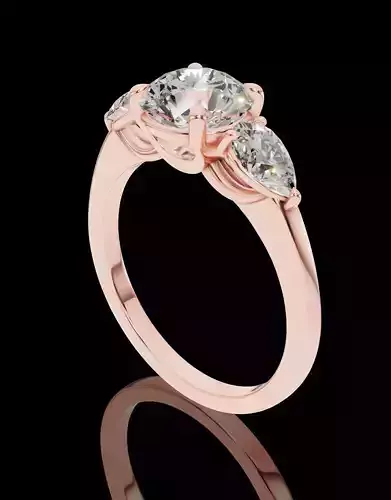 Classic Round And Pear Three-Stone Ring