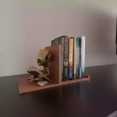 alien reading book book stand