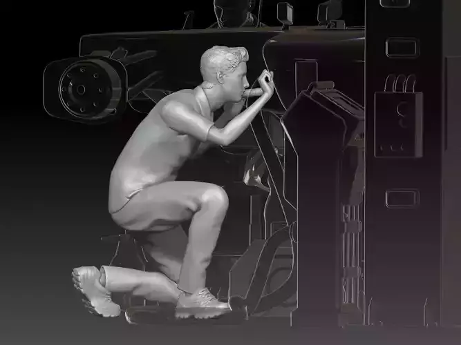 mechanic 2 at work in the garage during the Formula 1