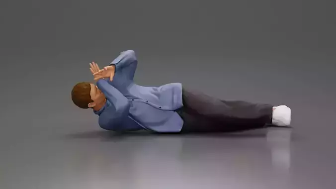 Man Lying on the Ground Defending Himself from an Attack