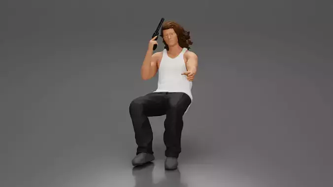 Man sitting with gun in hand pointing forward calmly