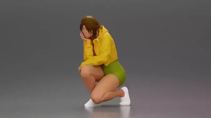 Performer crouching thoughtfully in jacket shorts white sneakers