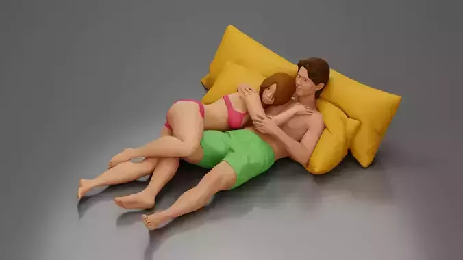 Couple cuddling affectionately on pillows wearing underwear