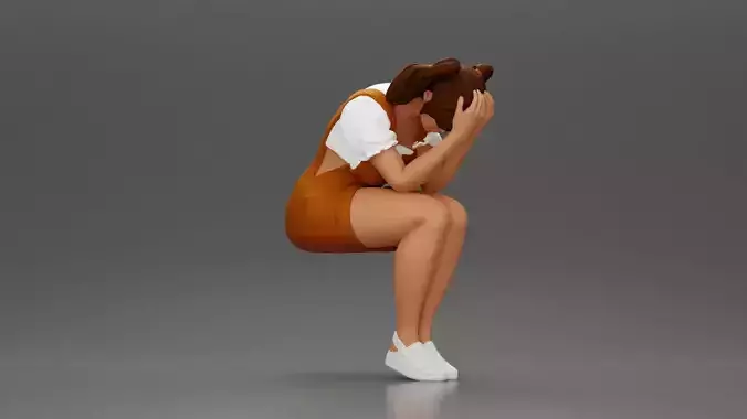 Crying girl sitting low in orange dress with head in hands 3D print model