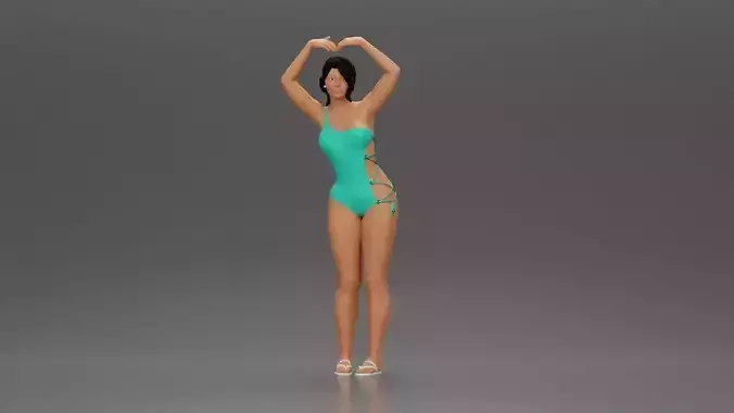 woman in turquoise swimsuit stretching with elegant ballet pose