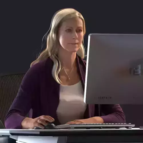 Blond female sitting behind a desk  3D model