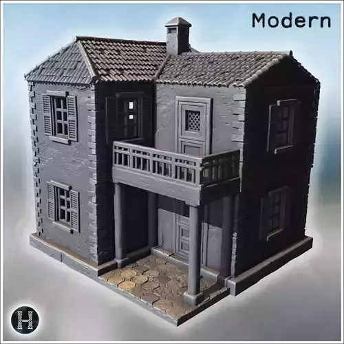 Two-story stone house with tile roof upper balcony and symmetric