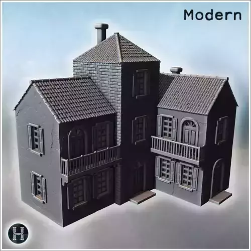 Symmetrical villa with central tower arched doors balconies and 