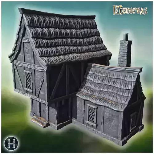 Half-timbered medieval house with thatched roof stone chimney wo