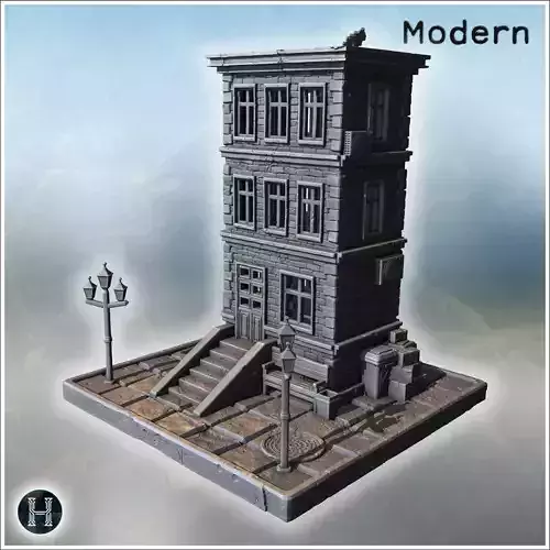 Tall stone residential building with stairs benches street lamps