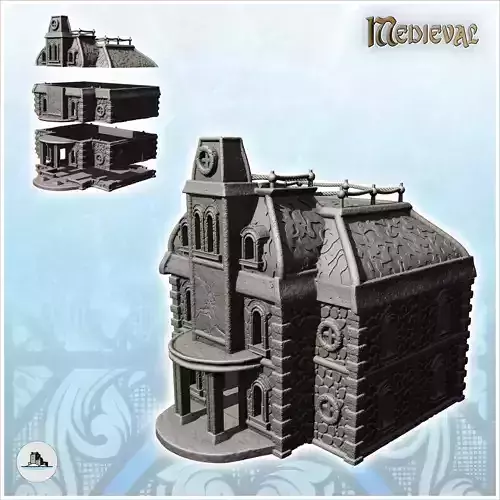 Large two-story stone building with entrance canopy and columns 