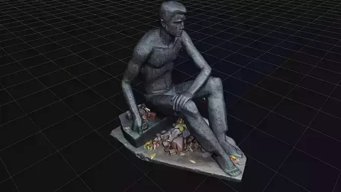 Statue of sitting on the ground man made of stone