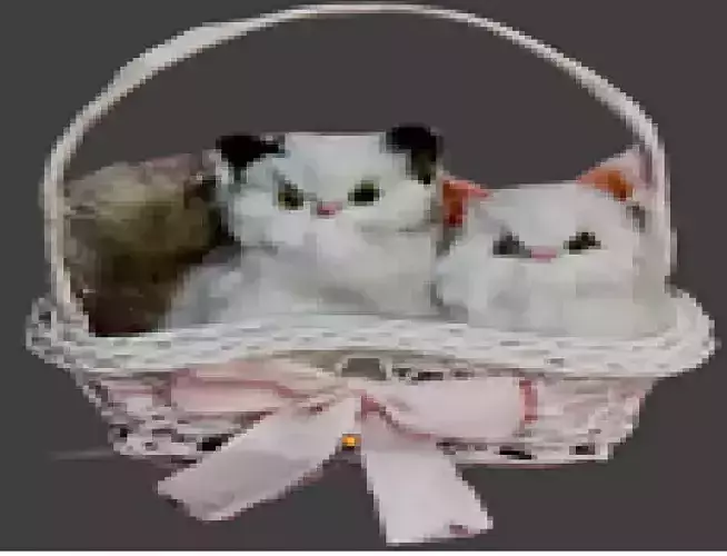 Two Toy Stuffed Cats in a Basket