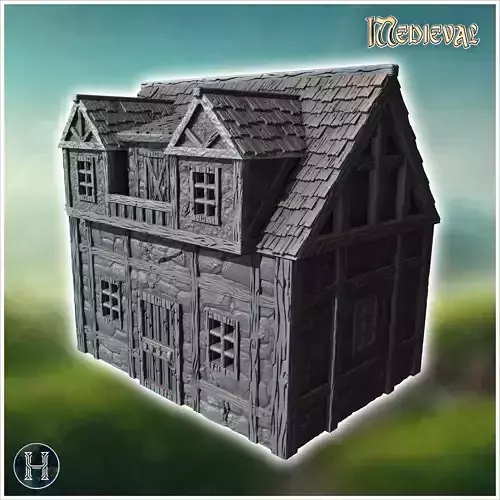 Two-story stone house with a front balcony arched windows and de