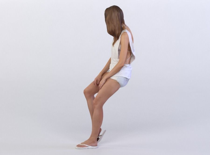 Julia 0315 Woman sitting on a high chair looking right