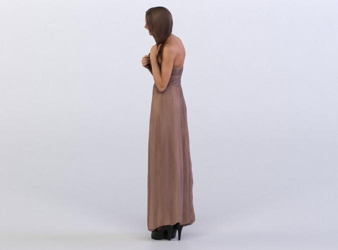 Julia 0303 Woman in a dress fixing her hair