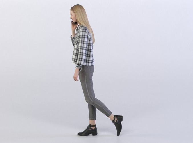 Janna 0408 Woman walking talking on a phone