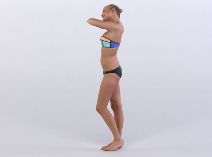 Carina 0239 Woman standing resting on a high barrier