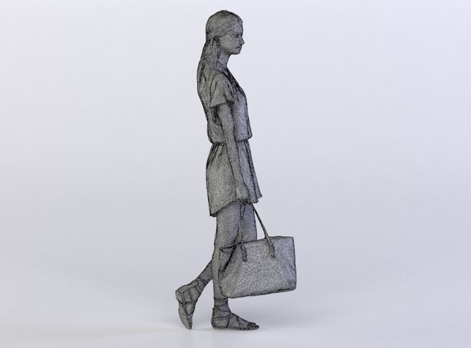 Belle 0285 Woman walking holding a bag