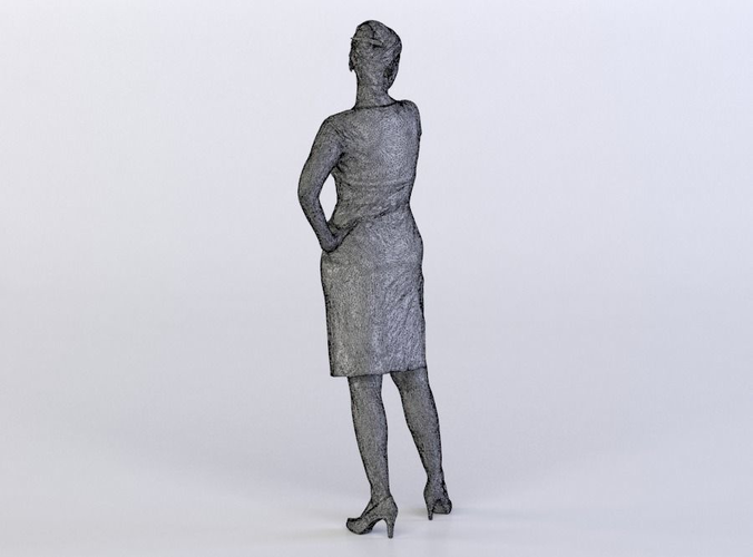 Anna 0016 Woman in a blue dress standing