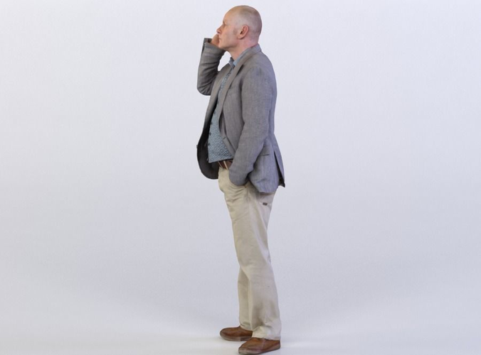 Steve 0044 Man in a suit talking on a phone