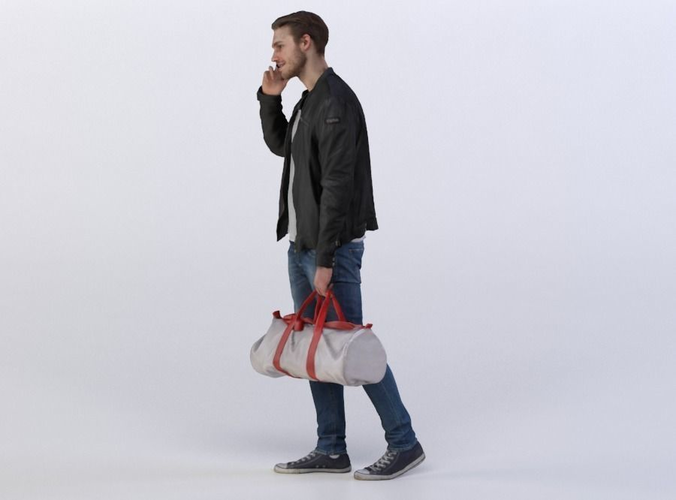 Mark 0454 Man carrying a duffel bag, talking on a phone