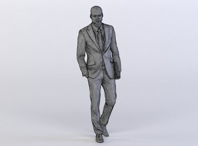 Christopher 0428 Man in a Suit holding a Laptop