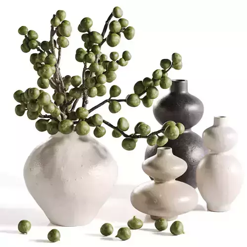 Green fig branches in artistic vases