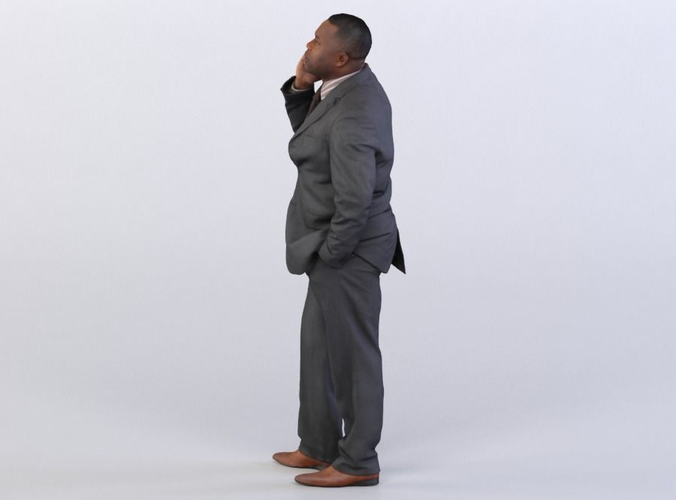 Ray 0145 Man in a suit talking on a phone