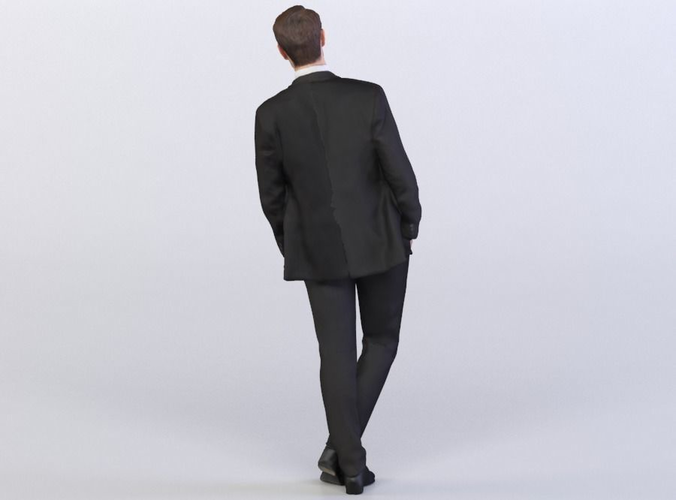 Joscha 0169 Man in a suit leaning left, legs crossed