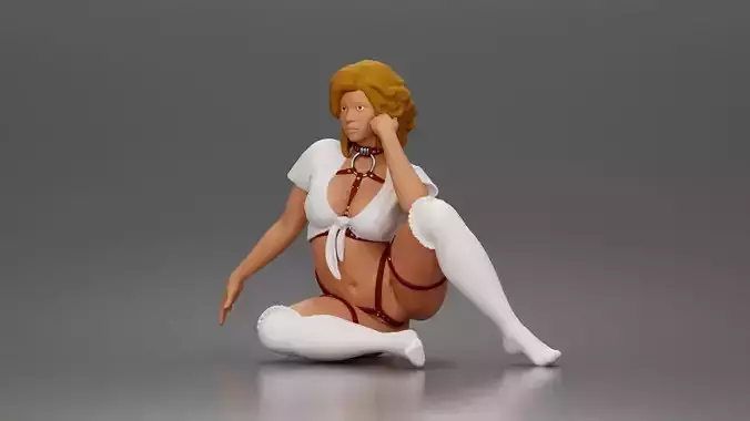 Kneeling woman wearing strappy harness lingerie garter stockings