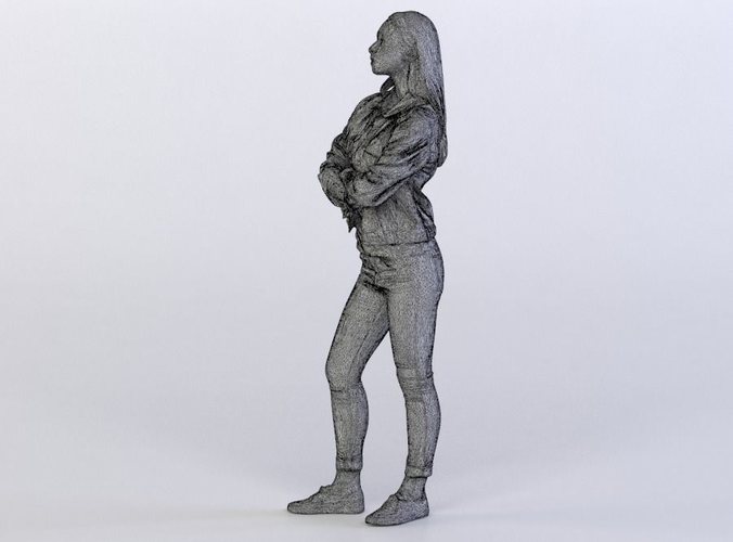 Tilda 0008 Woman in a denim jacket, arms folded