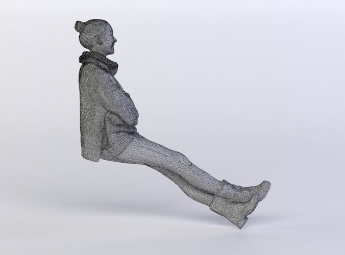 Julia 0264 Woman in a sweater sitting, arms folded