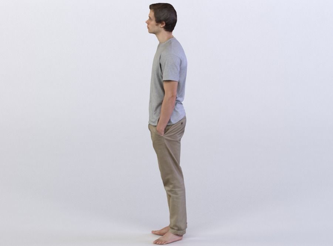 Liam 0082 Man standing barefoot, arms in pockets