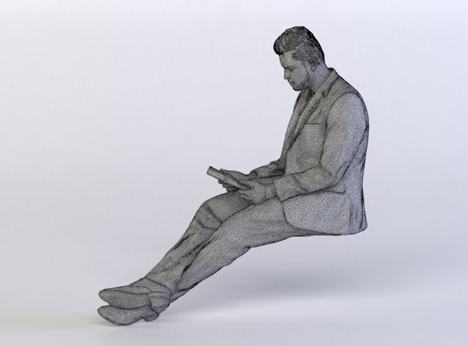 Amir 0439 Man in a Suit sitting, Looking at a Tablet